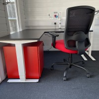 Bespoke portland HD chair with a height adjustable L shape desk and red bisley pedestal
